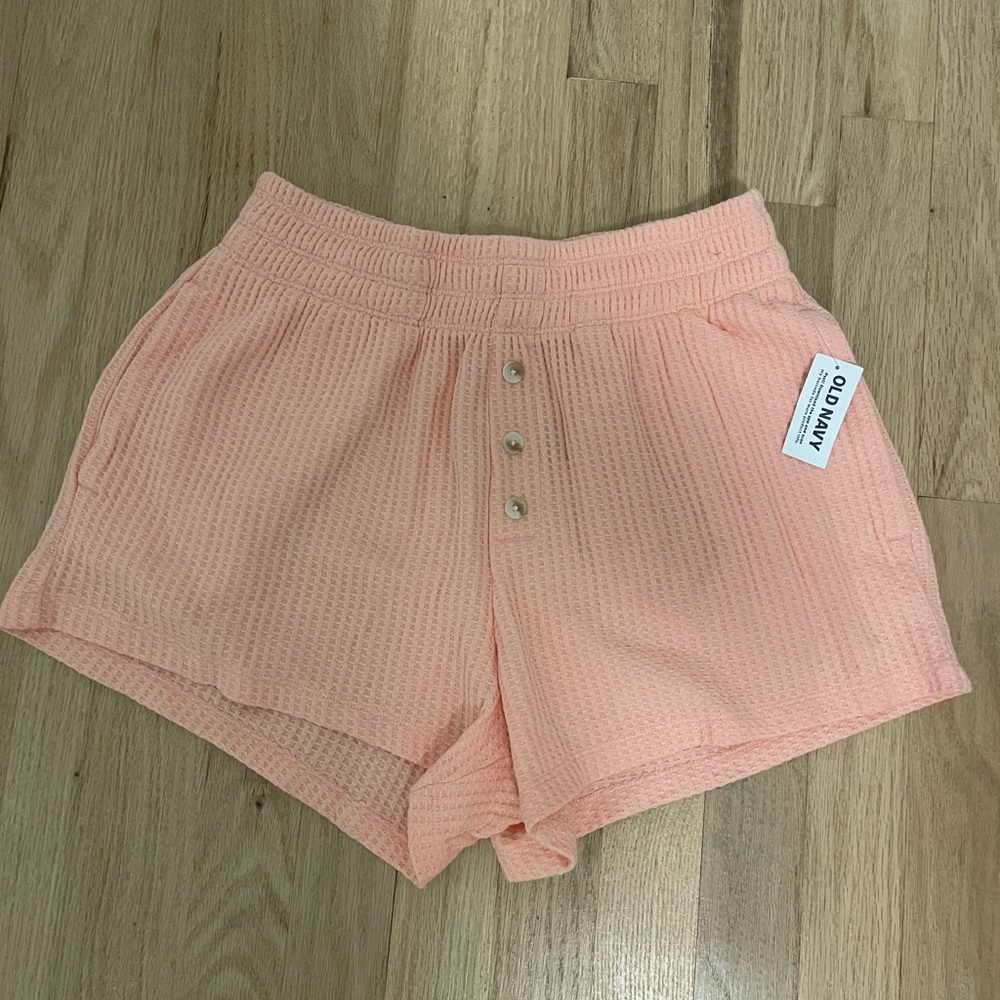 Old Navy women’s flowy shorts with buttons and pockets in orange; size xs